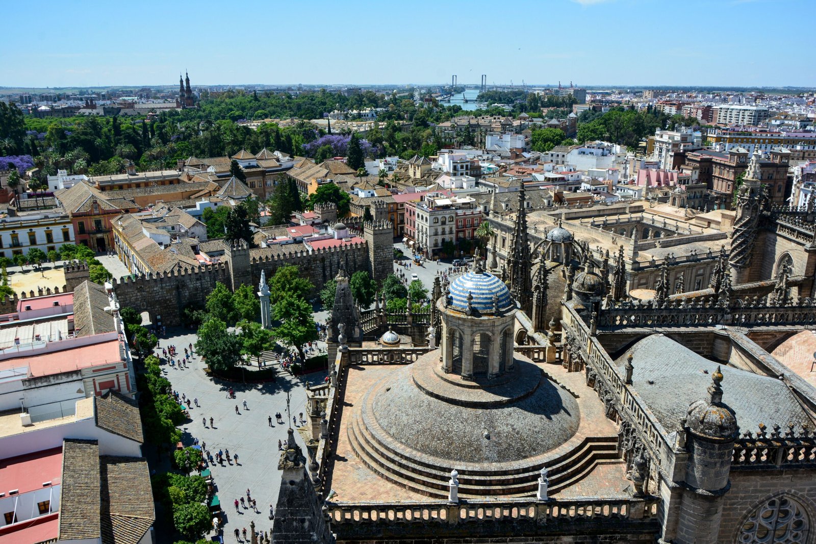 Stunning aerial view of Seville Cathedral with the cityscape of Seville, Spain on a sunny day.